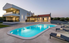 Villa Posidonia near Pula with sea view and surrounded by olive trees